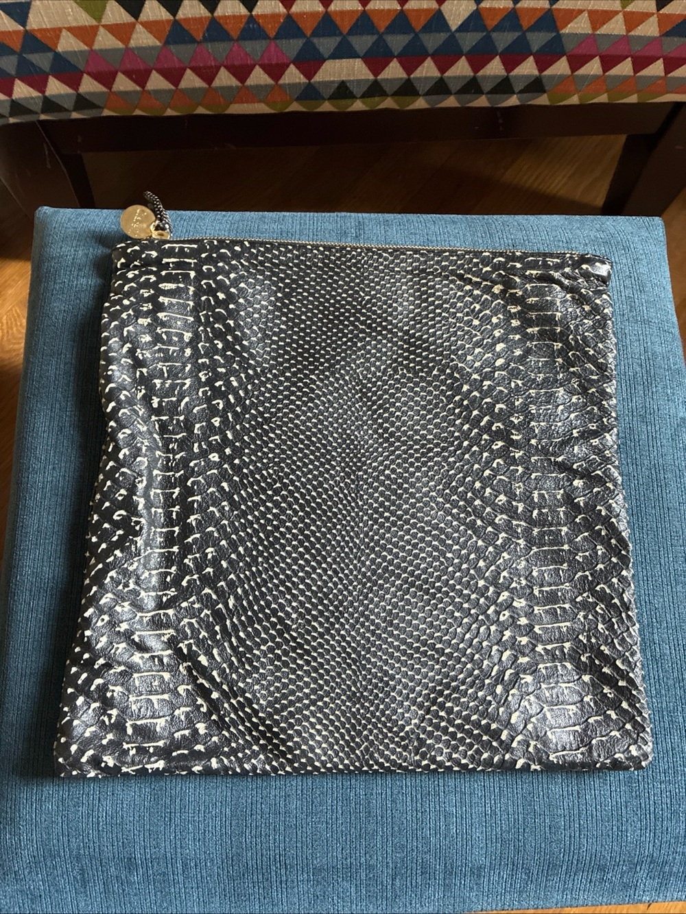Clare V. snake embossed black and tan fold over clutch